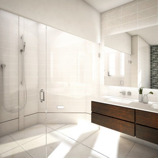 Alcove shower - modern gray tile alcove shower idea in Other with an undermount sink, flat-panel cabinets and dark wood cabinets