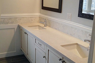 Example of a mid-sized transitional master brown tile and porcelain tile porcelain tile bathroom design in Toronto with gray walls