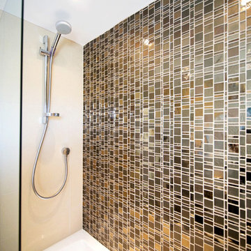 Modern bathroom shower wall with bronze glass mosaic