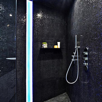 Modern bathroom shower with dark glass mosaic