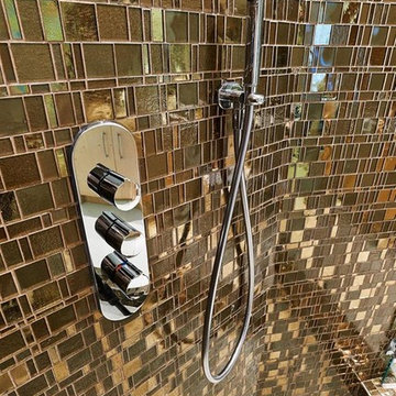 Modern bathroom with bronze mosaic