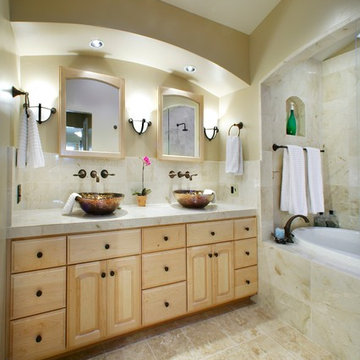 Modern Bathroom with Copper Colored Vessel Sinks