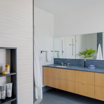 Modern Bathroom with Curbless Shower Niche, Textured Tiles, and Floating Dual Va