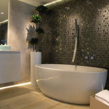 Modern bathroom with hand cut grey glass mosaic