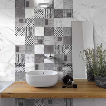 Modern bathroom with marble and multiple tile patterns