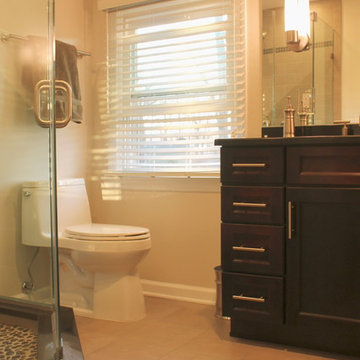 Modern Bathroom with Sconces and River Rock Shower