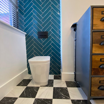 Modern bathrooms with herringbone tiling