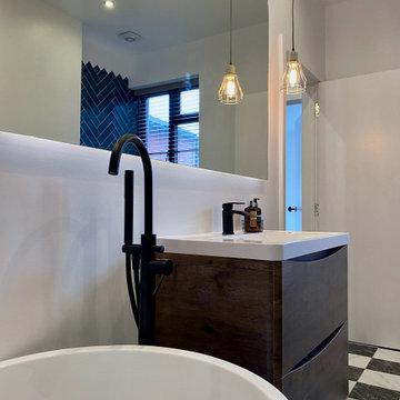 Modern bathrooms with herringbone tiling