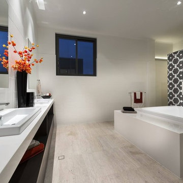 Modern black and white bathroom with mosaic backsplash design