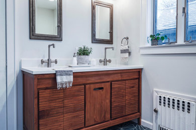Example of a large eclectic master cement tile floor, turquoise floor and double-sink bathroom design in New York with medium tone wood cabinets, gray walls, quartz countertops, white countertops and a freestanding vanity