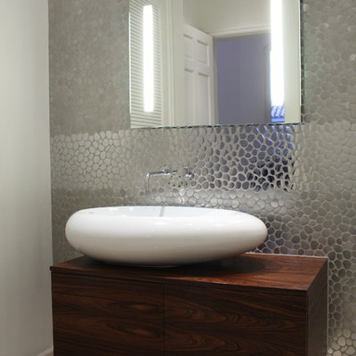 Trendy bathroom photo in Miami with a vessel sink