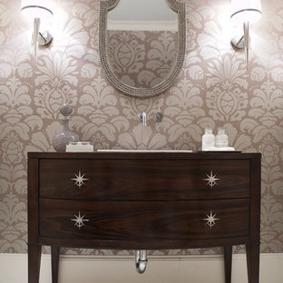 Transitional marble floor bathroom photo in Seattle with furniture-like cabinets, multicolored walls, a drop-in sink, dark wood cabinets, wood countertops and brown countertops