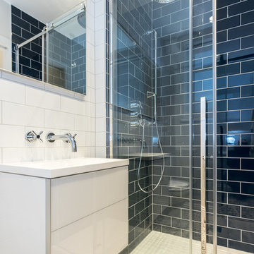 Modern dark blue and white shower room