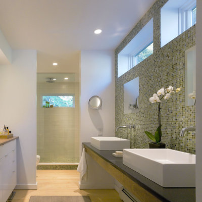 Inspiration for a farmhouse mosaic tile bathroom remodel in Burlington with a vessel sink