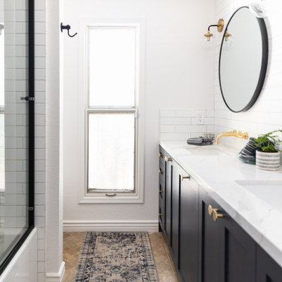Example of a mid-sized cottage 3/4 white tile and subway tile brown floor, double-sink and travertine floor bathroom design in Phoenix with shaker cabinets, white walls, an undermount sink, white countertops, a built-in vanity, blue cabinets, a one-piece toilet and quartz countertops