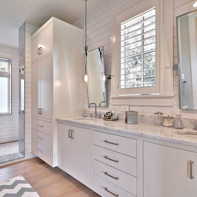 Country subway tile bathroom photo in Austin with an undermount sink