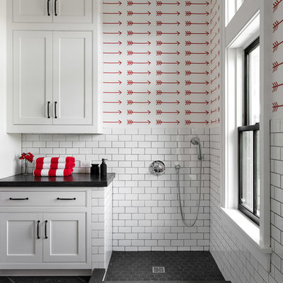 Bathroom - mid-sized cottage 3/4 white tile and subway tile slate floor and black floor bathroom idea in New York with shaker cabinets, white cabinets, white walls, concrete countertops and black countertops
