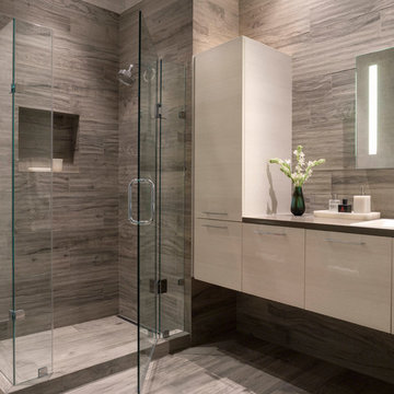 Modern Gray + White Bathroom with Floating Vanity + Glass Enclosed Shower