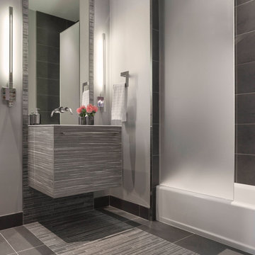 Modern Gray Mosaic Tile Bathroom with Floating Vanity + Linear Sconce Lighting