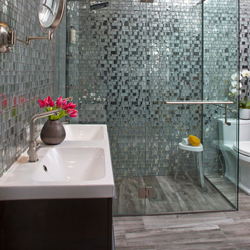 Modern grey bathroom with glass mosaic shower