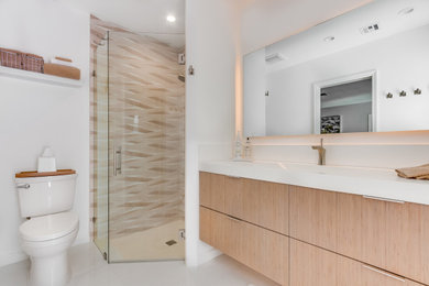 Inspiration for a small bathroom remodel in Miami with flat-panel cabinets and a floating vanity