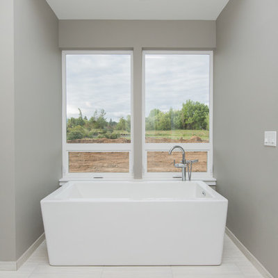 Large trendy master gray tile and ceramic tile ceramic tile bathroom photo in Portland with shaker cabinets, white cabinets, a one-piece toilet, blue walls, a console sink and tile countertops