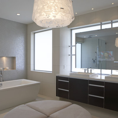 Minimalist mosaic tile bathroom photo in Vancouver with a vessel sink