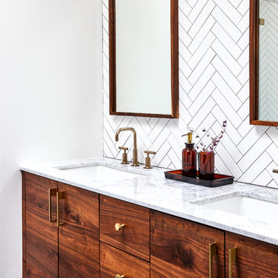 Example of a transitional master white tile blue floor bathroom design in Philadelphia with flat-panel cabinets, medium tone wood cabinets, white walls and an undermount sink