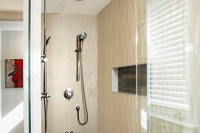 Example of a mid-sized minimalist master beige tile and porcelain tile porcelain tile double shower design in Philadelphia with furniture-like cabinets, brown cabinets, a two-piece toilet, beige walls, an undermount sink and limestone countertops