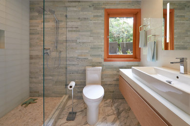 Inspiration for a contemporary 3/4 gray tile and slate tile bathroom remodel in Seattle with flat-panel cabinets and white walls