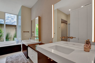 Inspiration for a contemporary japanese bathtub remodel in Dallas with flat-panel cabinets, dark wood cabinets, an undermount sink and white countertops