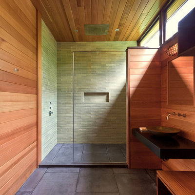 Example of a minimalist cement tile bathroom design in New York with a vessel sink
