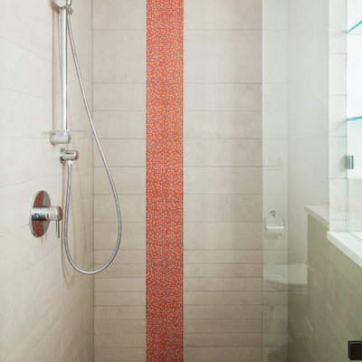 Example of a mid-sized trendy 3/4 gray tile and porcelain tile porcelain tile alcove shower design in Denver with white walls, a vessel sink and solid surface countertops