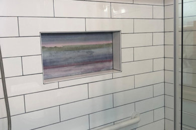 Bathroom - small white tile and porcelain tile bathroom idea in Baltimore