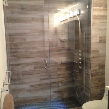 Modern shower with wood look porcelain tile