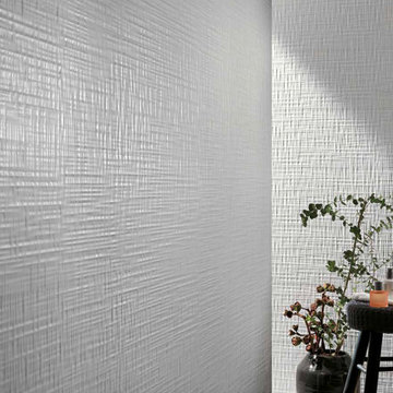 Modern white bathroom with white textured porcelain tile walls