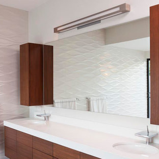 Large modern master bathroom in Miami with a corner shower, white tile, white walls, bamboo floors, brown floor, flat-panel cabinets, brown cabinets, a drop-in sink and granite benchtops.