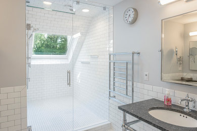 Inspiration for a large traditional ensuite bathroom in Chicago with open cabinets, an alcove shower, a two-piece toilet, white tiles, metro tiles, grey walls, marble flooring, a submerged sink, granite worktops, white floors and a hinged door.