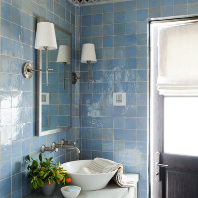 Tuscan blue tile bathroom photo in Orange County with a vessel sink