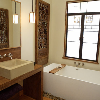 Freestanding bathtub - contemporary freestanding bathtub idea in San Francisco with a vessel sink
