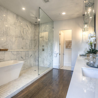 Large transitional master white tile and marble tile dark wood floor and brown floor bathroom photo in Houston with an undermount sink, furniture-like cabinets, a two-piece toilet, white walls, quartz countertops and white countertops