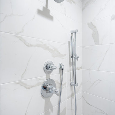 Freestanding bathtub - large shabby-chic style porcelain tile freestanding bathtub idea in Sacramento with marble countertops