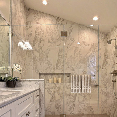 Example of a mid-sized transitional master brown tile ceramic tile double shower design in San Francisco with an undermount sink, recessed-panel cabinets, white cabinets, a one-piece toilet and green walls