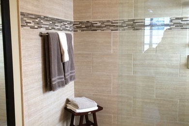 Inspiration for a mid-sized transitional 3/4 beige tile and porcelain tile porcelain tile and beige floor bathroom remodel in Raleigh with beige walls