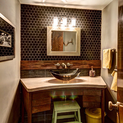 Inspiration for an eclectic kids' black tile bathroom remodel in Grand Rapids with concrete countertops and a vessel sink