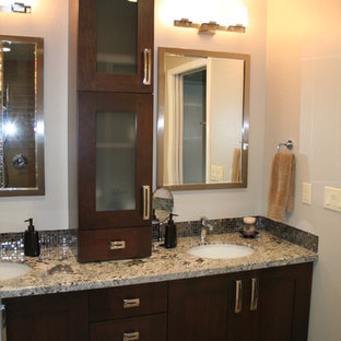 Mid-sized elegant master gray tile and stone tile travertine floor bathroom photo in San Francisco with an undermount sink, recessed-panel cabinets, dark wood cabinets, granite countertops and beige walls