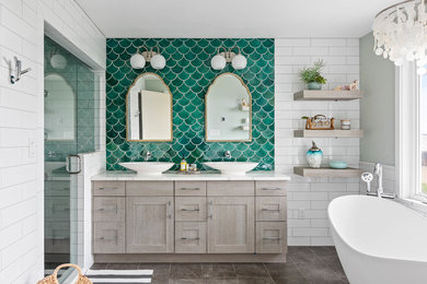 Large beach style master green tile and subway tile porcelain tile and gray floor bathroom photo in Seattle with gray cabinets, a vessel sink, quartz countertops, a hinged shower door, white countertops, shaker cabinets and green walls