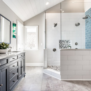 Bathroom - large transitional master white tile and porcelain tile vinyl floor, gray floor, double-sink, shiplap ceiling and vaulted ceiling bathroom idea in Indianapolis with shaker cabinets, blue cabinets, gray walls, an undermount sink, quartz countertops, white countertops, a niche and a freestanding vanity