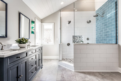 Bathroom - large transitional master white tile and porcelain tile vinyl floor, gray floor, double-sink, shiplap ceiling and vaulted ceiling bathroom idea in Indianapolis with shaker cabinets, blue cabinets, gray walls, an undermount sink, quartz countertops, white countertops, a niche and a freestanding vanity