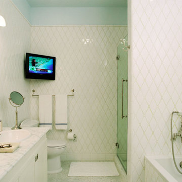 Mosaic tiles make this bathroom feel like soft tufted fabric